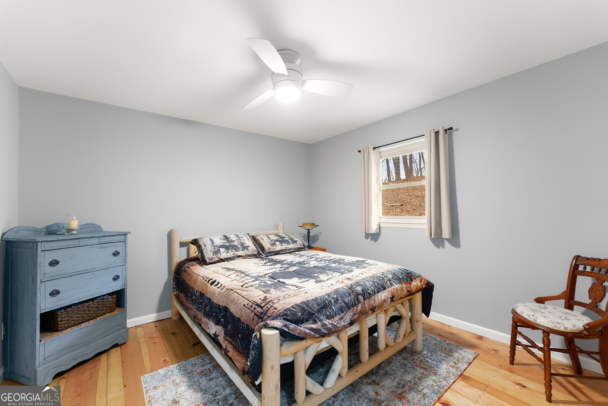 426 Skyview Circle Clarkesville, GA 30523 - Photo 15 of 42 a bedroom with a bed and a dresser