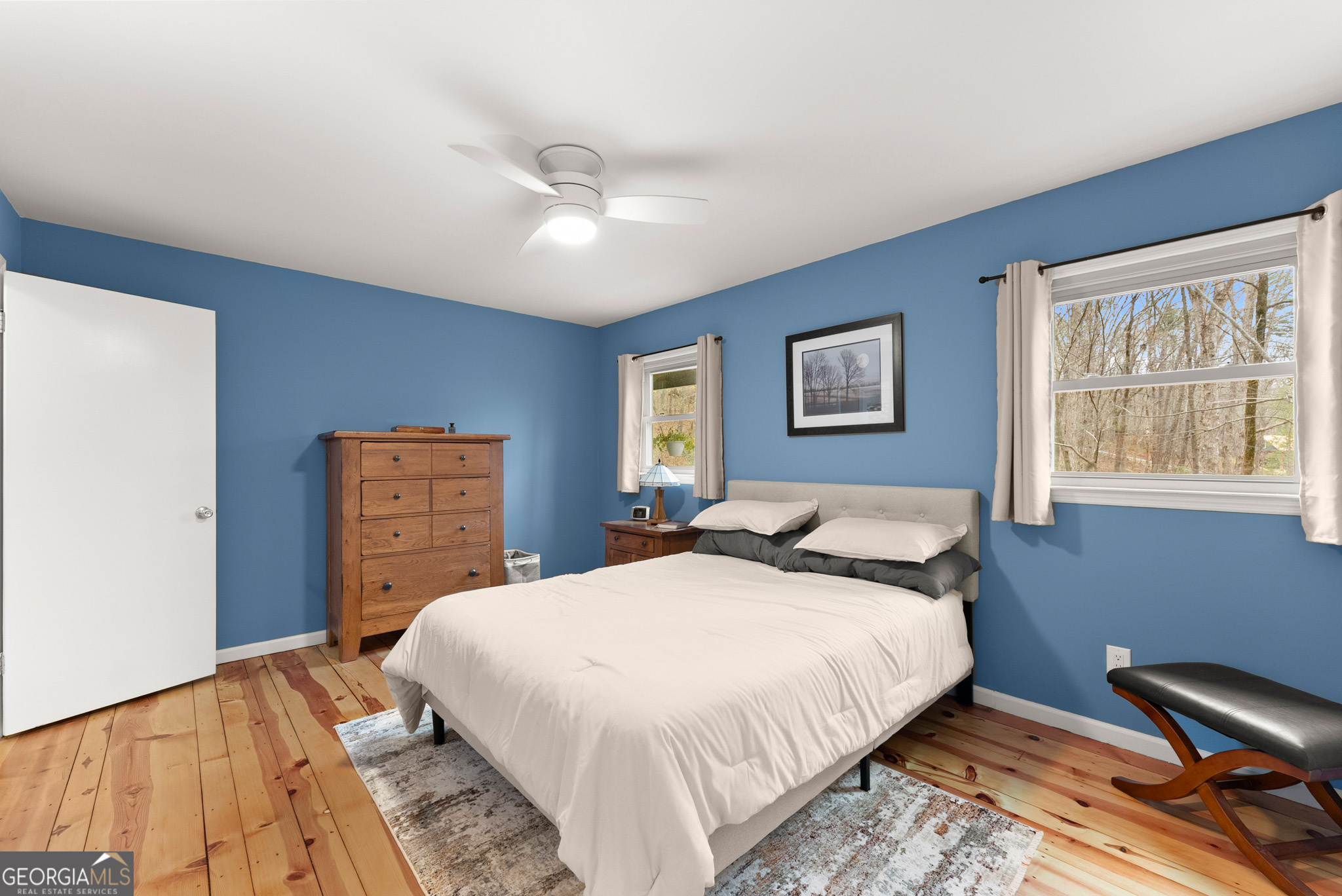 426 Skyview Circle Clarkesville, GA 30523 - Photo 19 of 42 a bedroom with a bed and a closet
