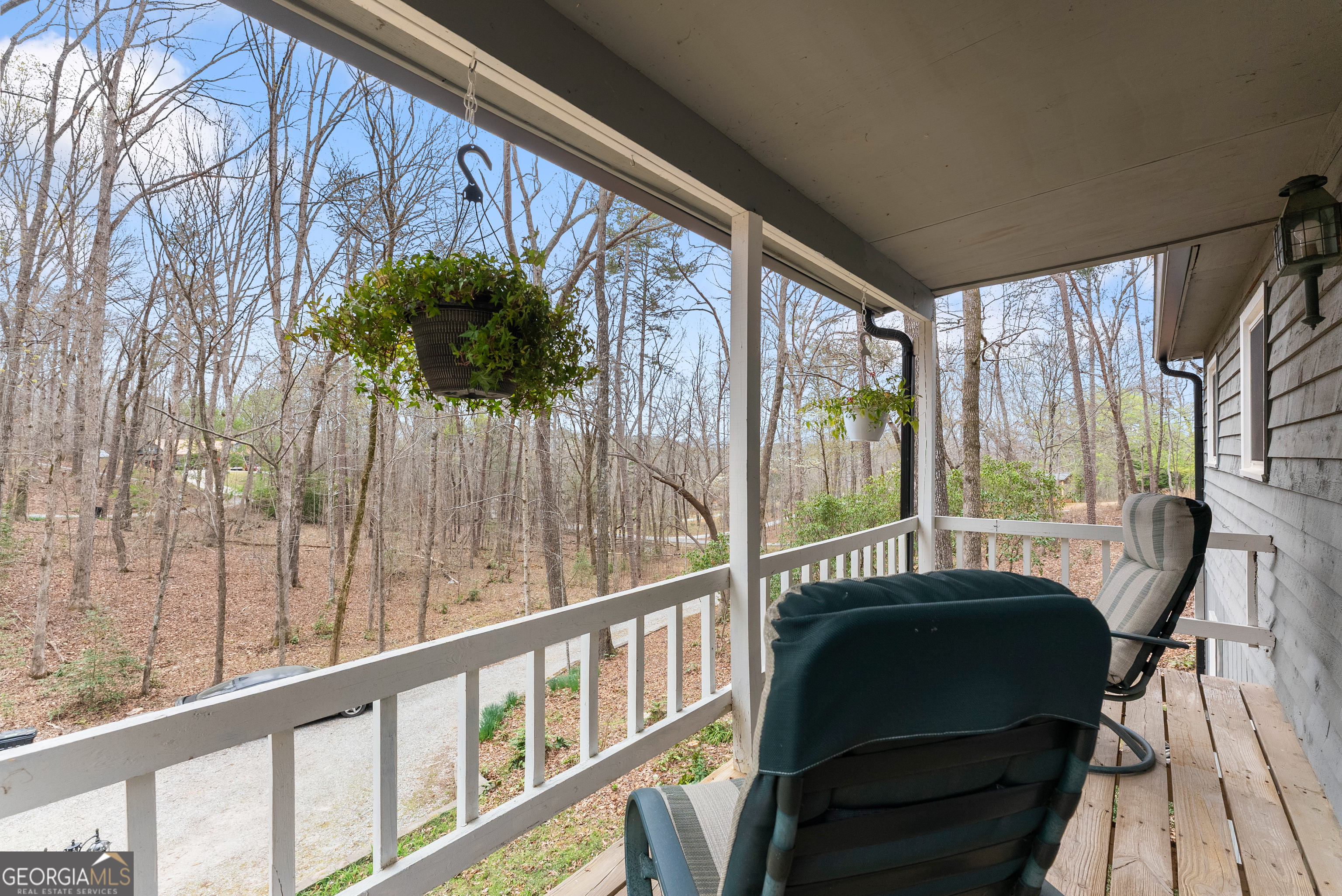 426 Skyview Circle Clarkesville, GA 30523 - Photo 26 of 42 a view of a porch with furniture and wooden deck