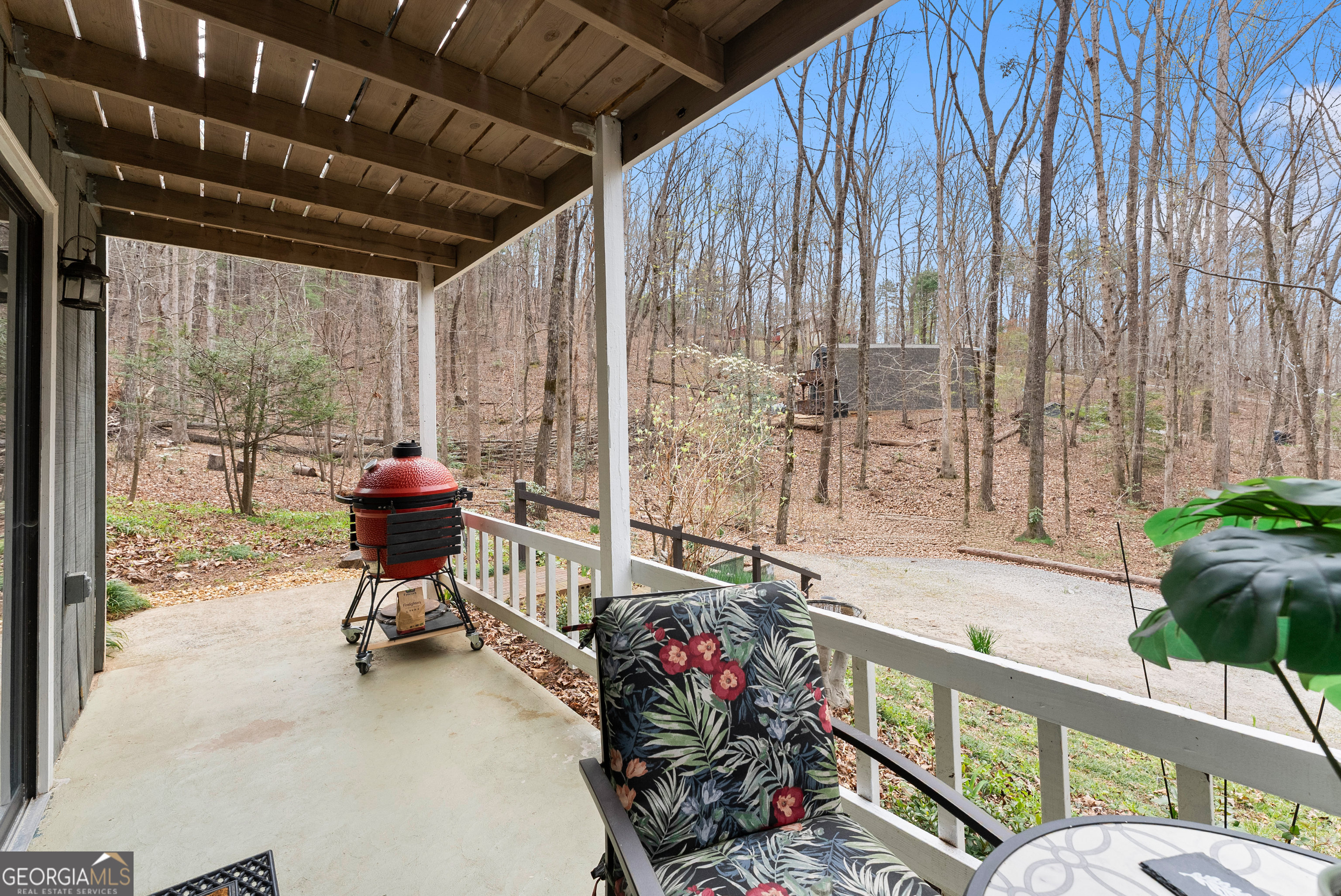 426 Skyview Circle Clarkesville, GA 30523 - Photo 33 of 42 a view of a porch with furniture and a yard