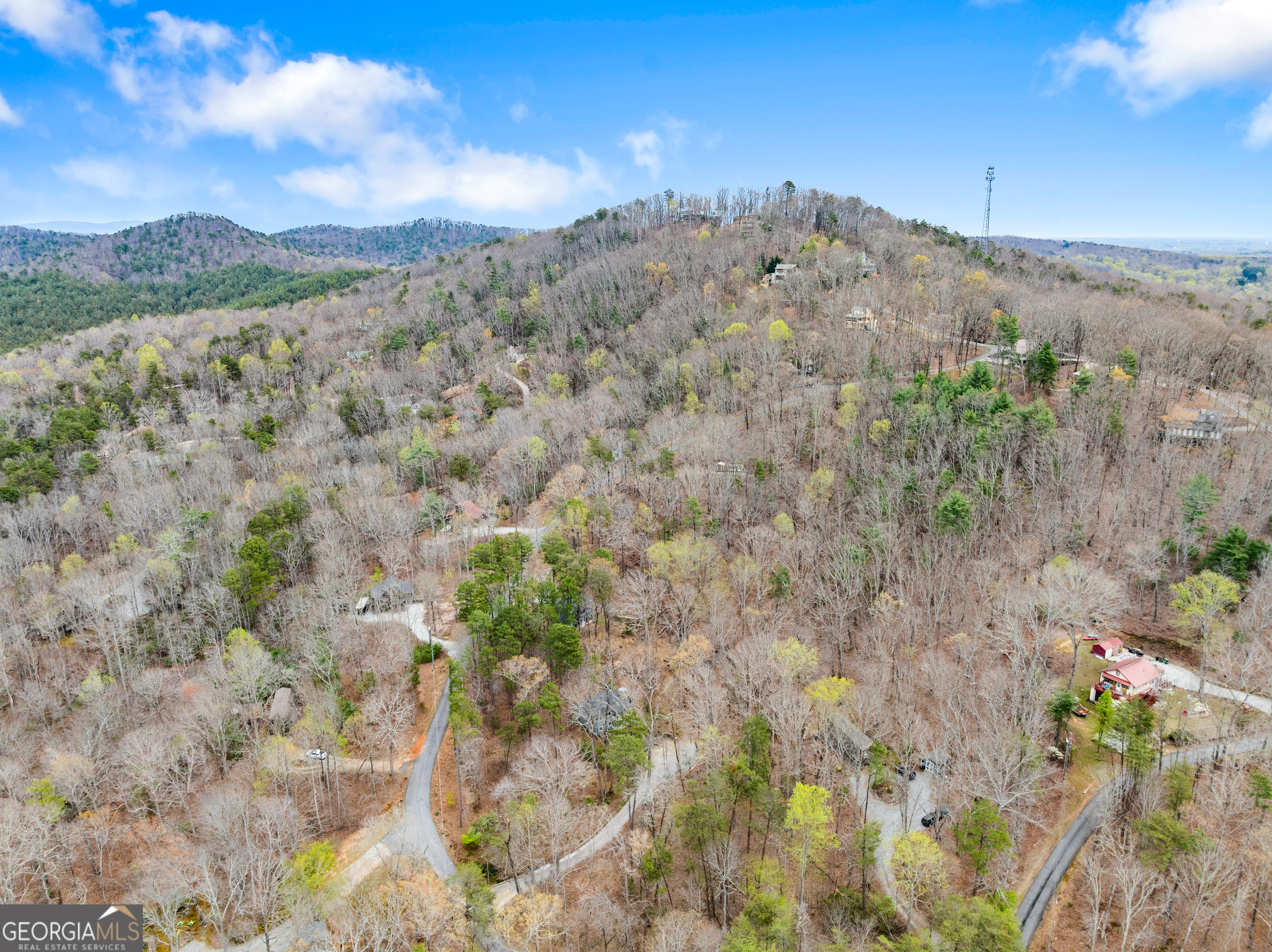426 Skyview Circle Clarkesville, GA 30523 - Photo 39 of 42 a view of a houses with a mountain in the background