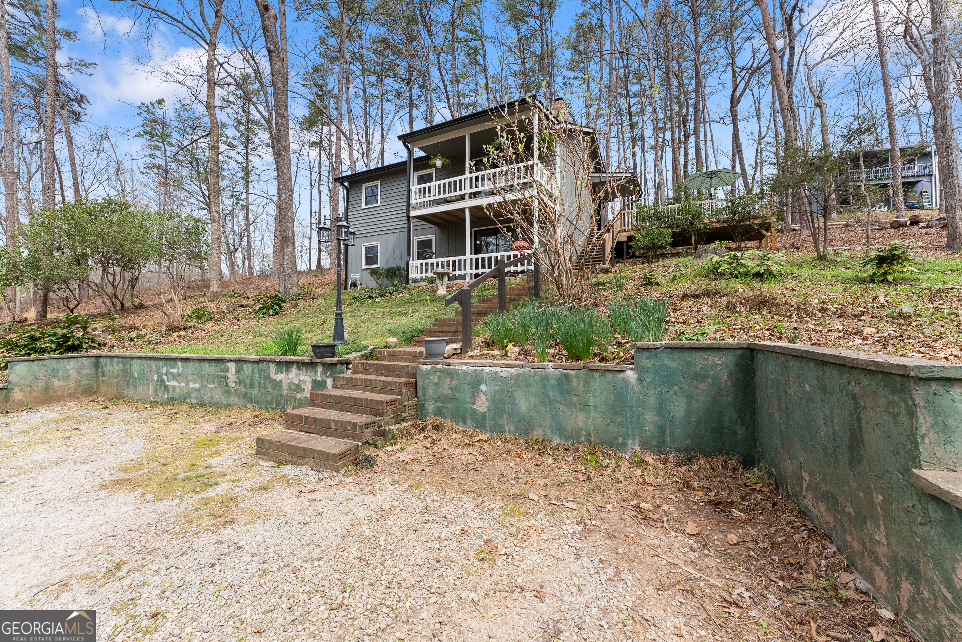 426 Skyview Circle Clarkesville, GA 30523 - Photo 7 of 42 a view of a lake with a house