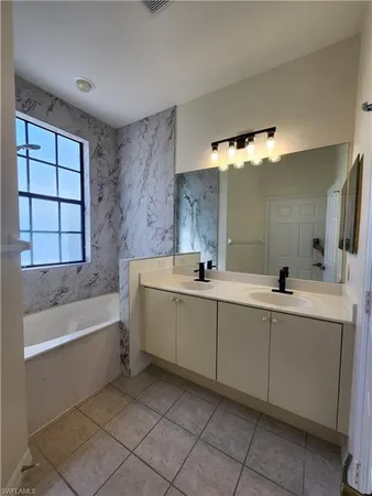 $2,595 | 14708 Sutherland Avenue, Naples, FL 34119