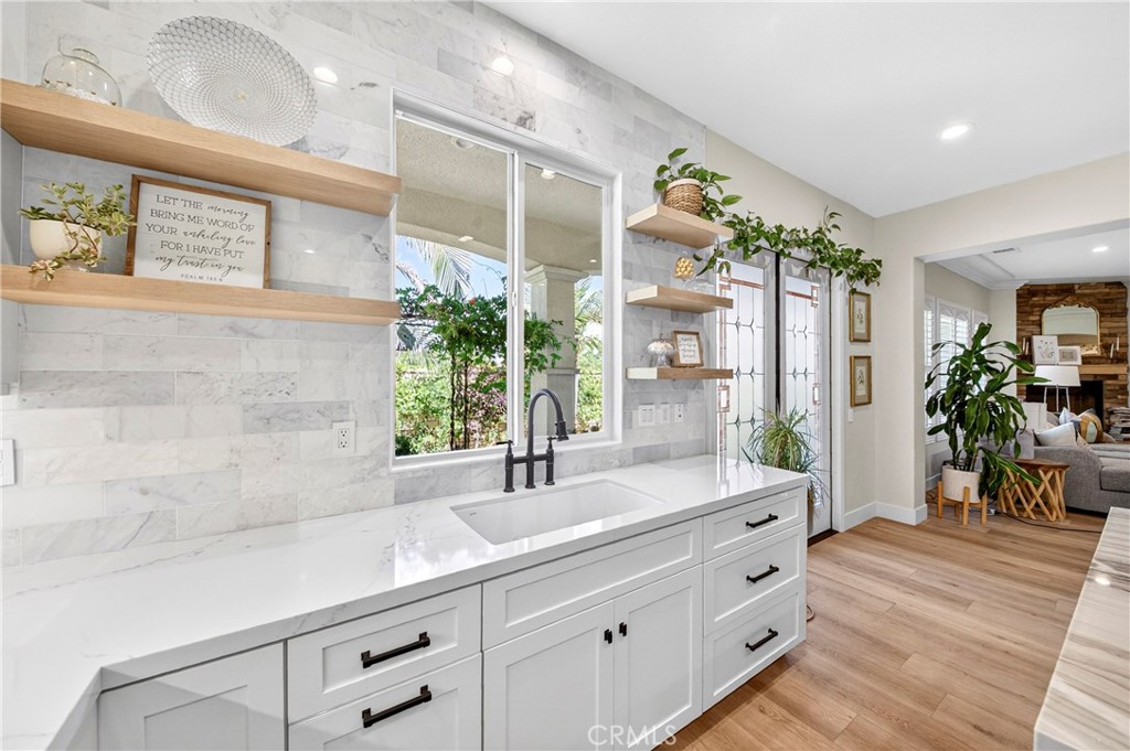 16375 Ory Circle Riverside, CA 92503 - Photo 17 of 51 a bathroom with a double vanity sink and a mirror