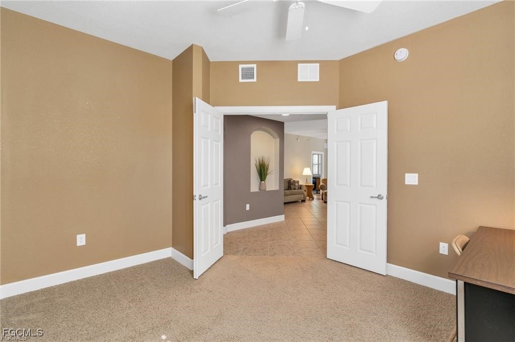 12905 New Market Street, Unit 102 Fort Myers, FL 33913 - Photo 21 of 30 a view of a hallway with a room