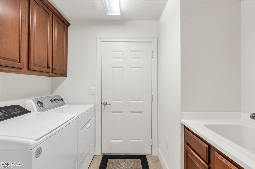 12905 New Market Street, Unit 102 Fort Myers, FL 33913 - Photo 22 of 30 a room with storage and utility