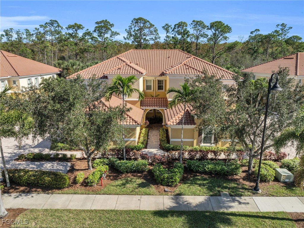 12905 New Market Street, Unit 102 Fort Myers, FL 33913 - Photo 4 of 30 an aerial view of a house