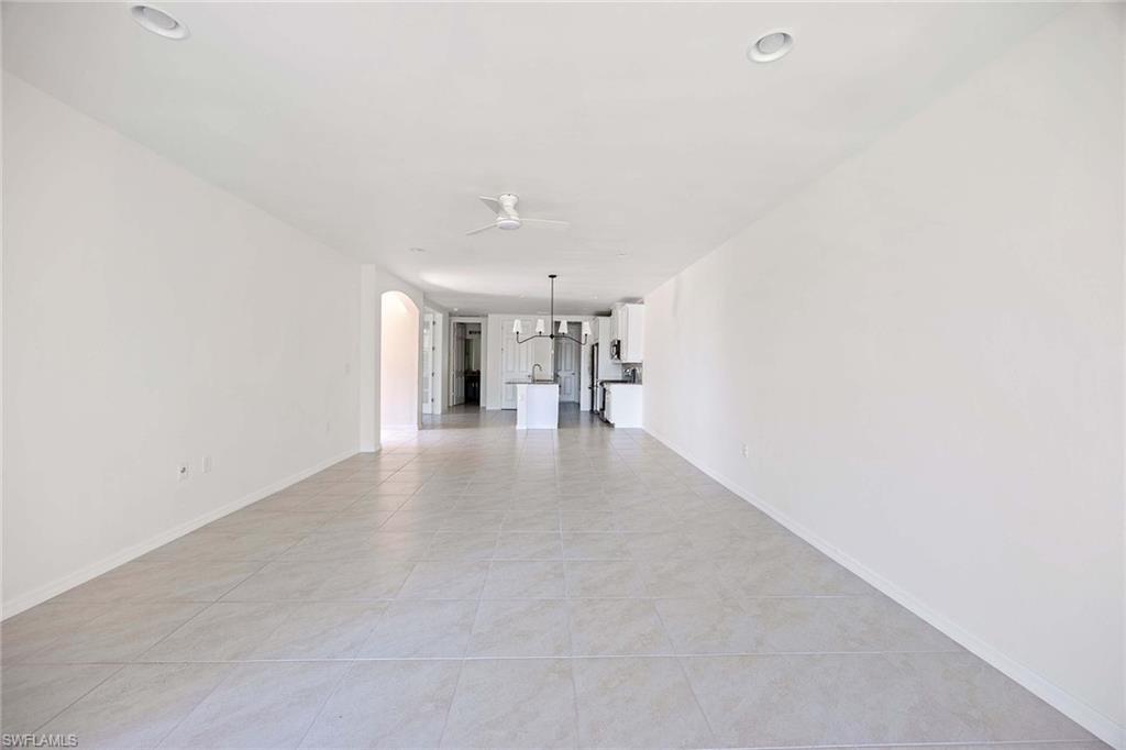 14799 Edgewater Circle Naples, FL 34114 - Photo 15 of 35 a view of empty room