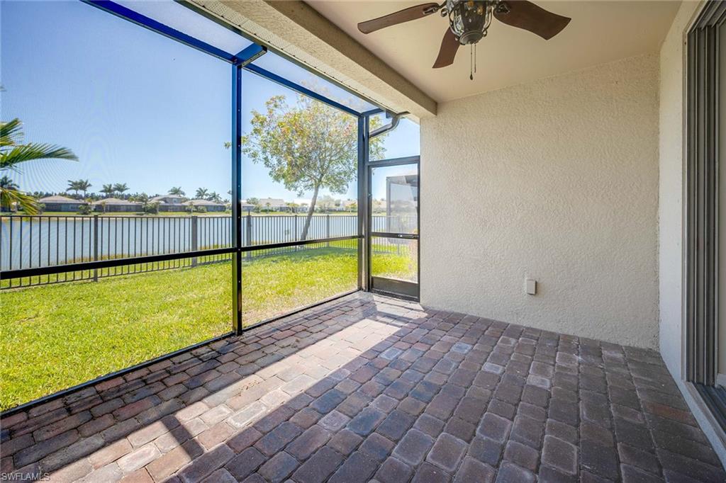 14799 Edgewater Circle Naples, FL 34114 - Photo 21 of 35 a view of a room with a swimming pool