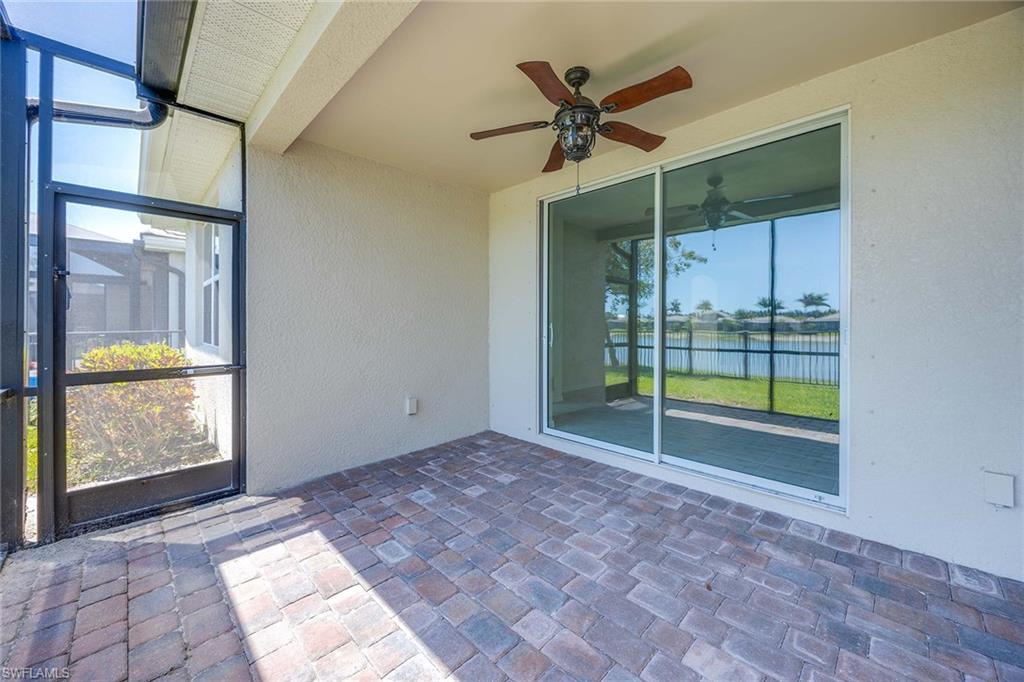 14799 Edgewater Circle Naples, FL 34114 - Photo 22 of 35 a view of an empty room with a window