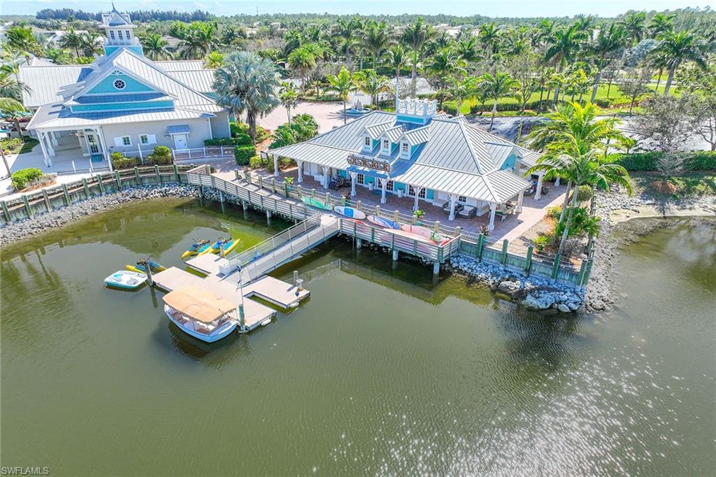 14799 Edgewater Circle Naples, FL 34114 - Photo 28 of 35 an aerial view of a house with swimming pool and outdoor seating
