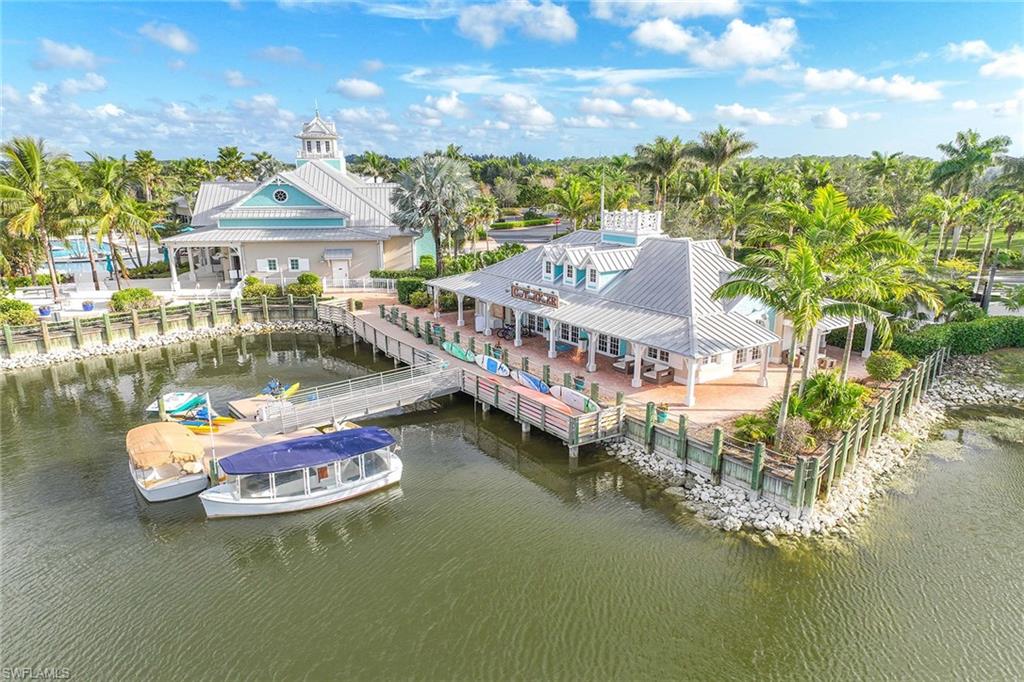 14799 Edgewater Circle Naples, FL 34114 - Photo 33 of 35 a view of a lake with a mountain