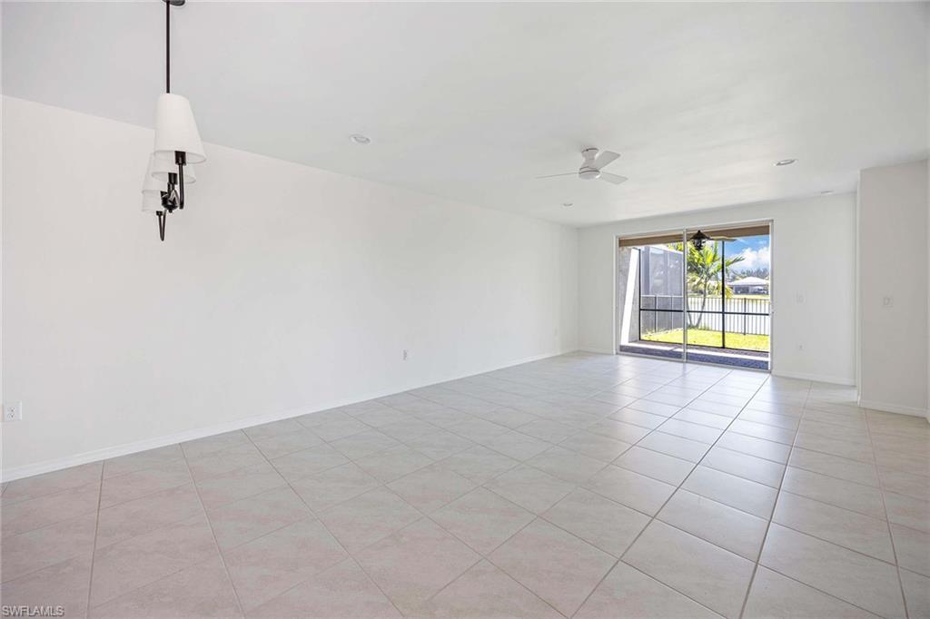 14799 Edgewater Circle Naples, FL 34114 - Photo 7 of 35 a view of an empty room with a window