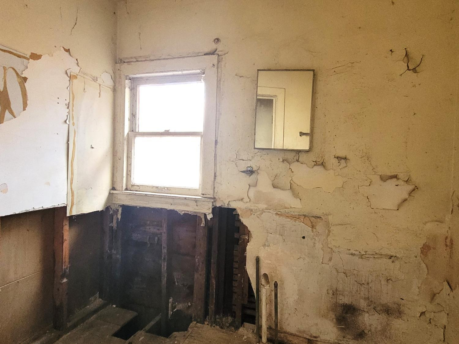 1736 Fillmore Street Gary, IN 46407 - Photo 8 of 14 a bathroom with a sink and a mirror
