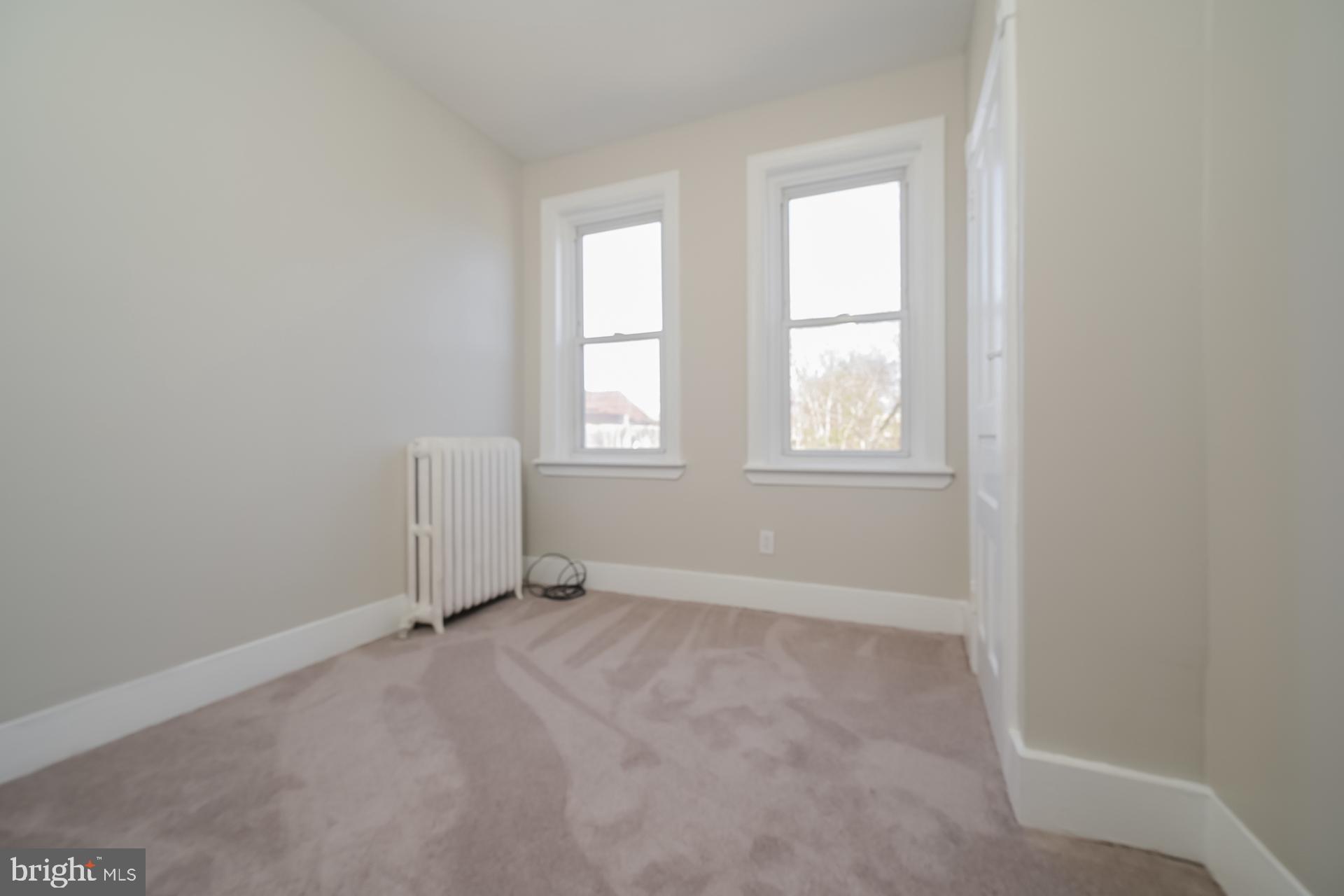 2629 North 34th Street Philadelphia, PA 19132 - Photo 9 of 10 an empty room with windows