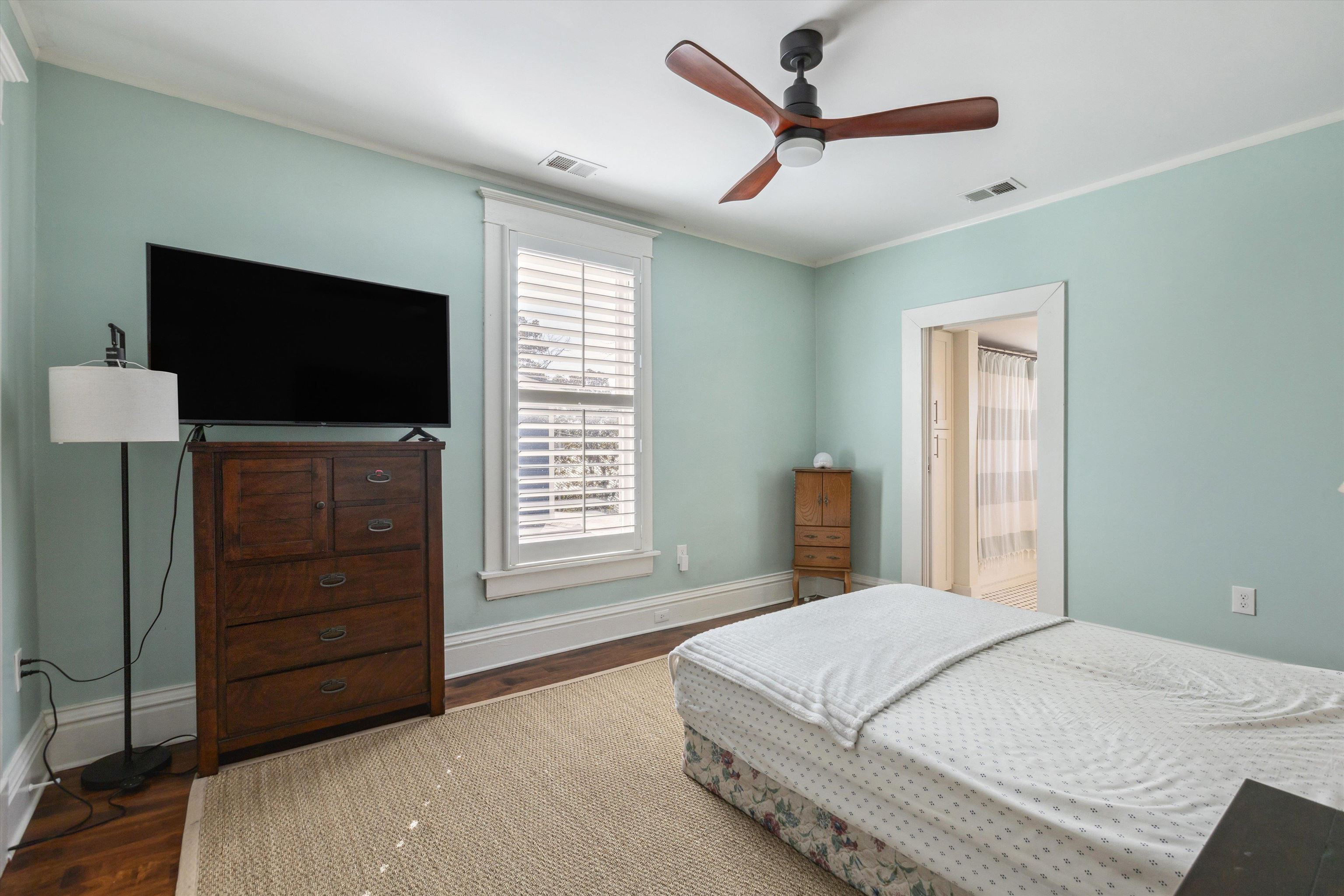 779 Roland Street Memphis, TN 38104 - Photo 16 of 29 a bedroom with a bed and a flat screen tv
