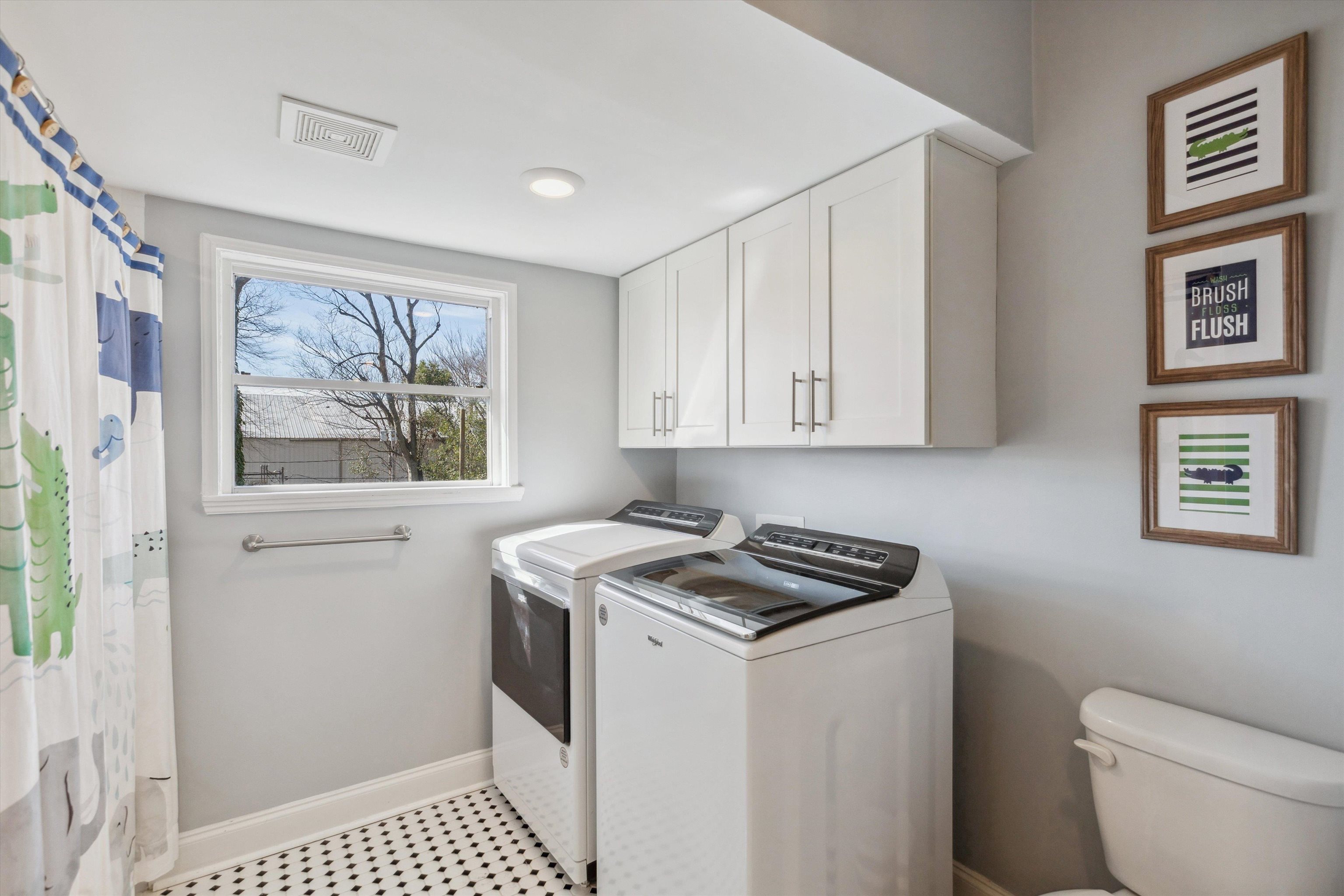 779 Roland Street Memphis, TN 38104 - Photo 20 of 29 a kitchen with a cabinets and a stove top oven