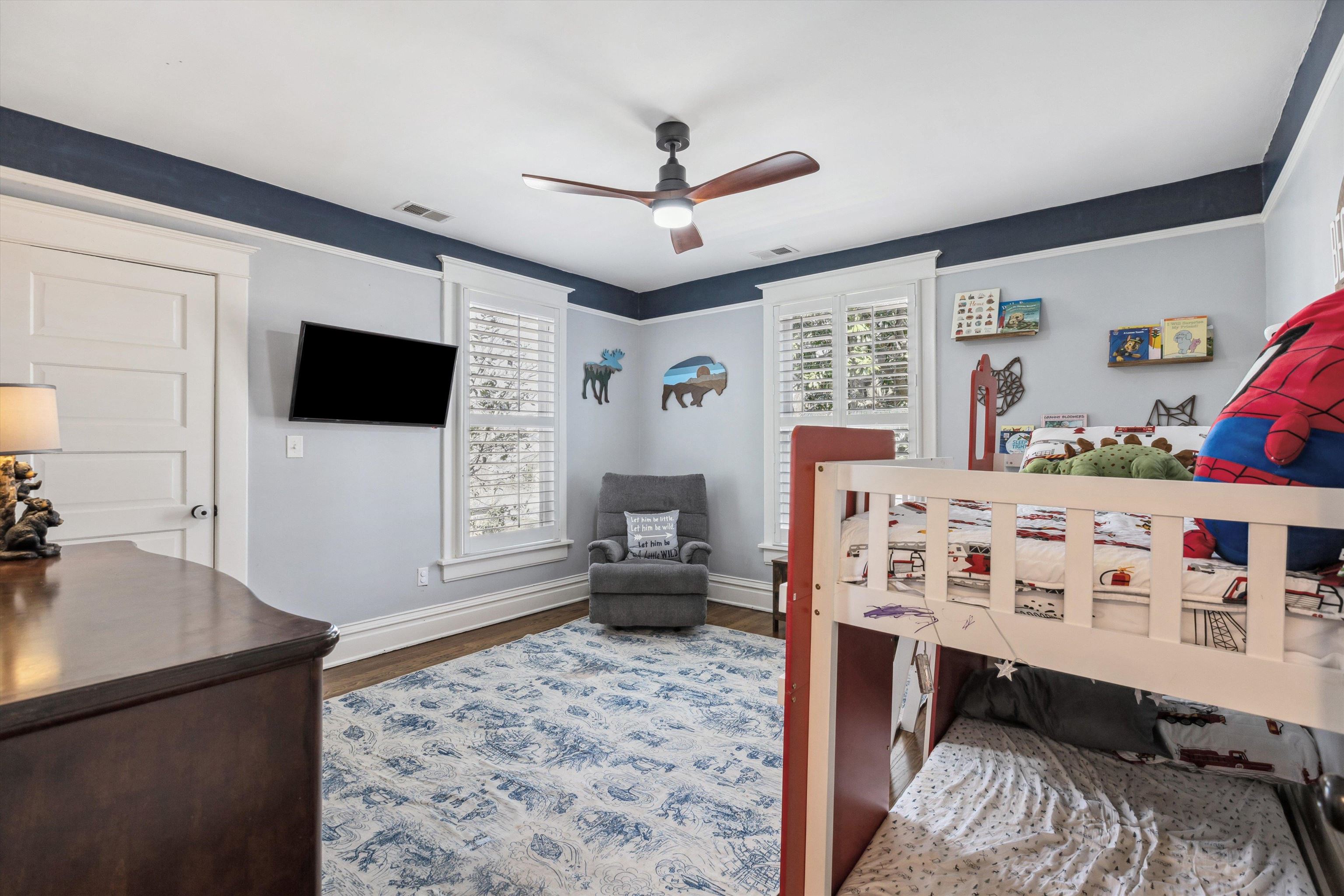 779 Roland Street Memphis, TN 38104 - Photo 21 of 29 a living room with furniture and a flat screen tv