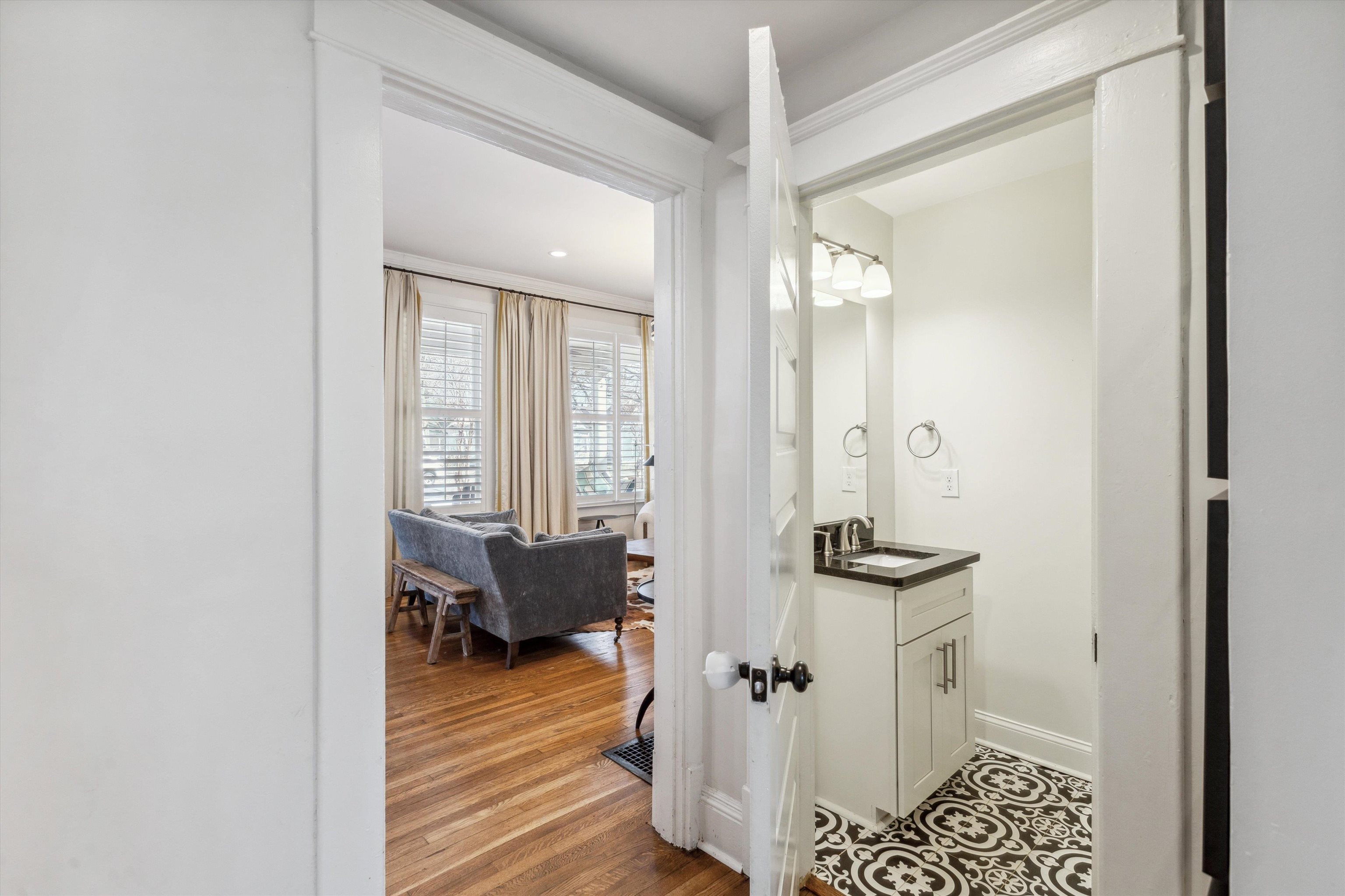 779 Roland Street Memphis, TN 38104 - Photo 7 of 29 a view of a room with wooden floor and furniture