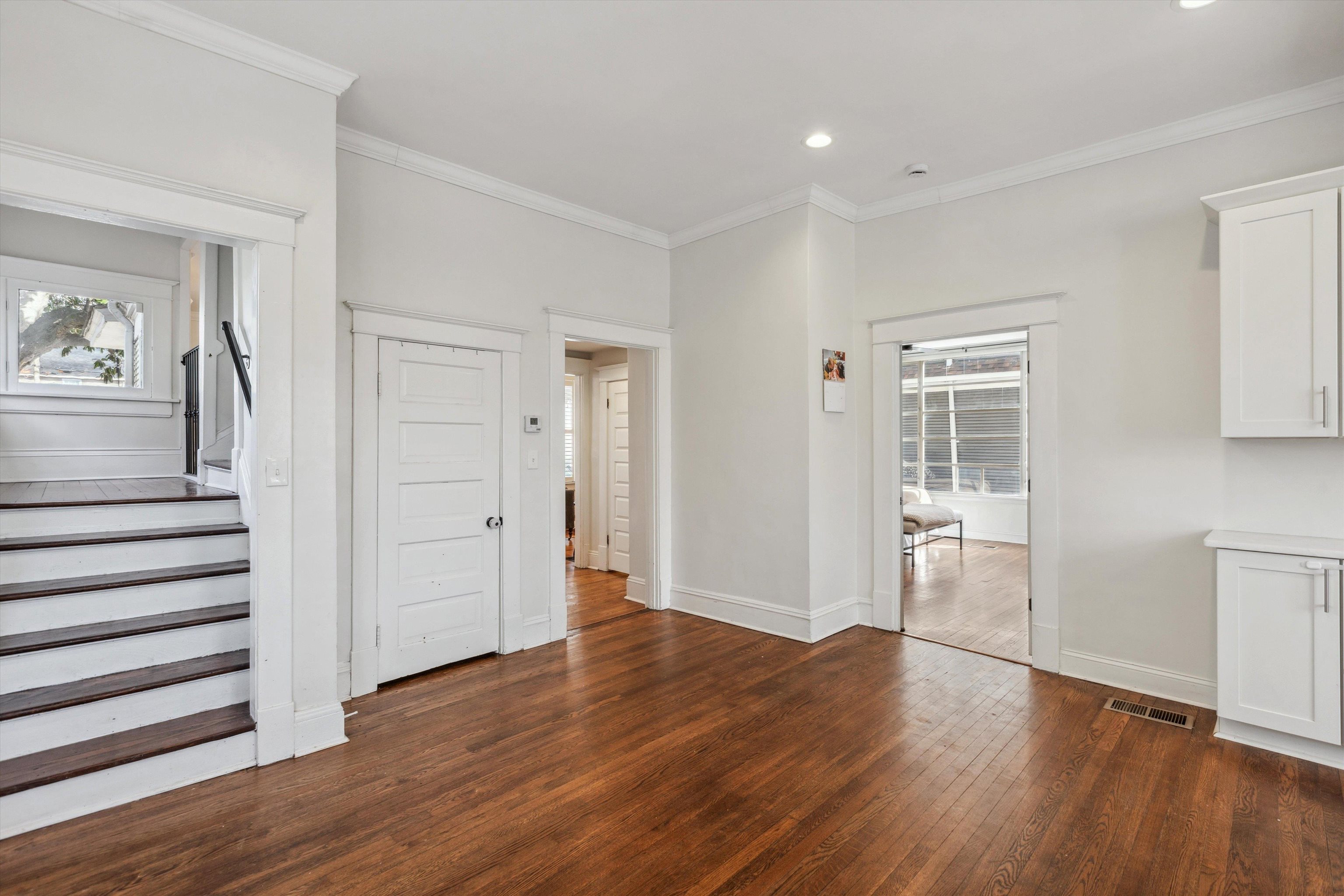 779 Roland Street Memphis, TN 38104 - Photo 9 of 29 wooden floor in an empty room with a window