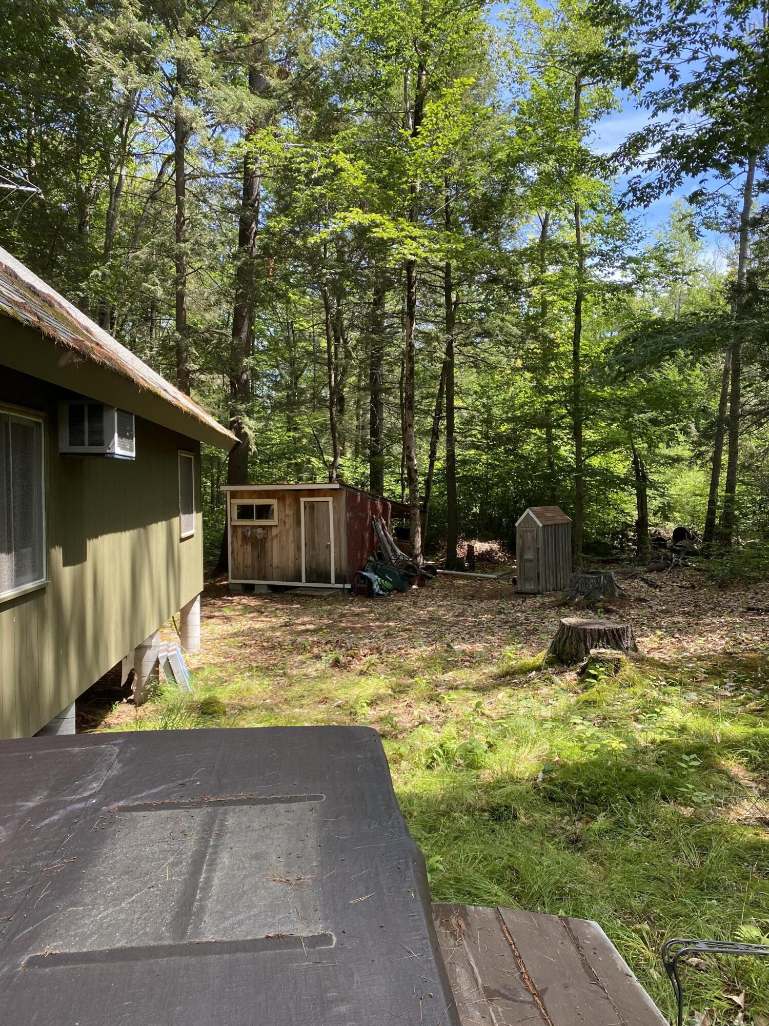 801 Beach View Drive Standish, ME 04084 - Photo 21 of 28 Side Yard w/Hot Tub