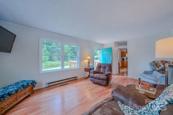a living room with furniture and a window