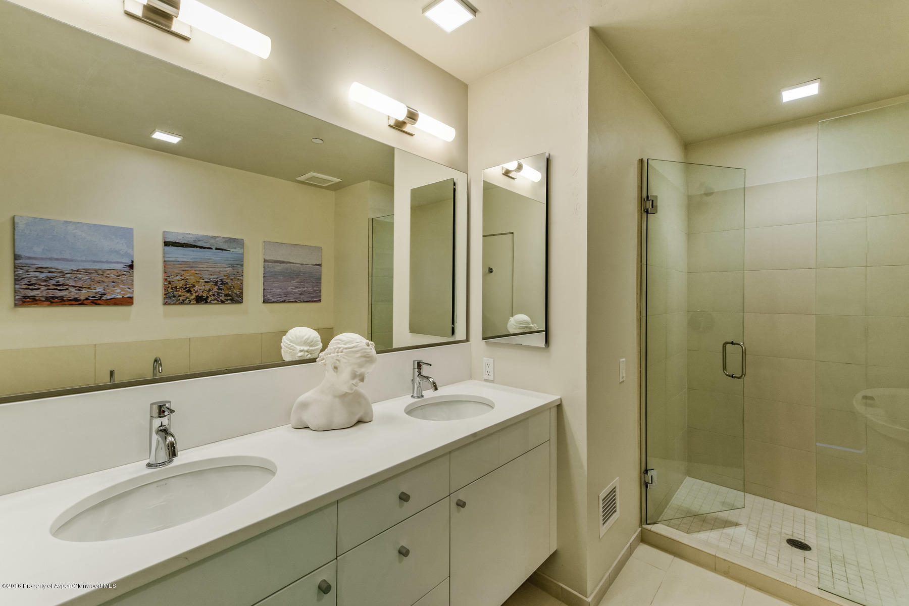 104 Evans Road, Unit 201 Basalt, CO 81621 - Photo 14 of 23 a bathroom with a double vanity sink mirror and shower
