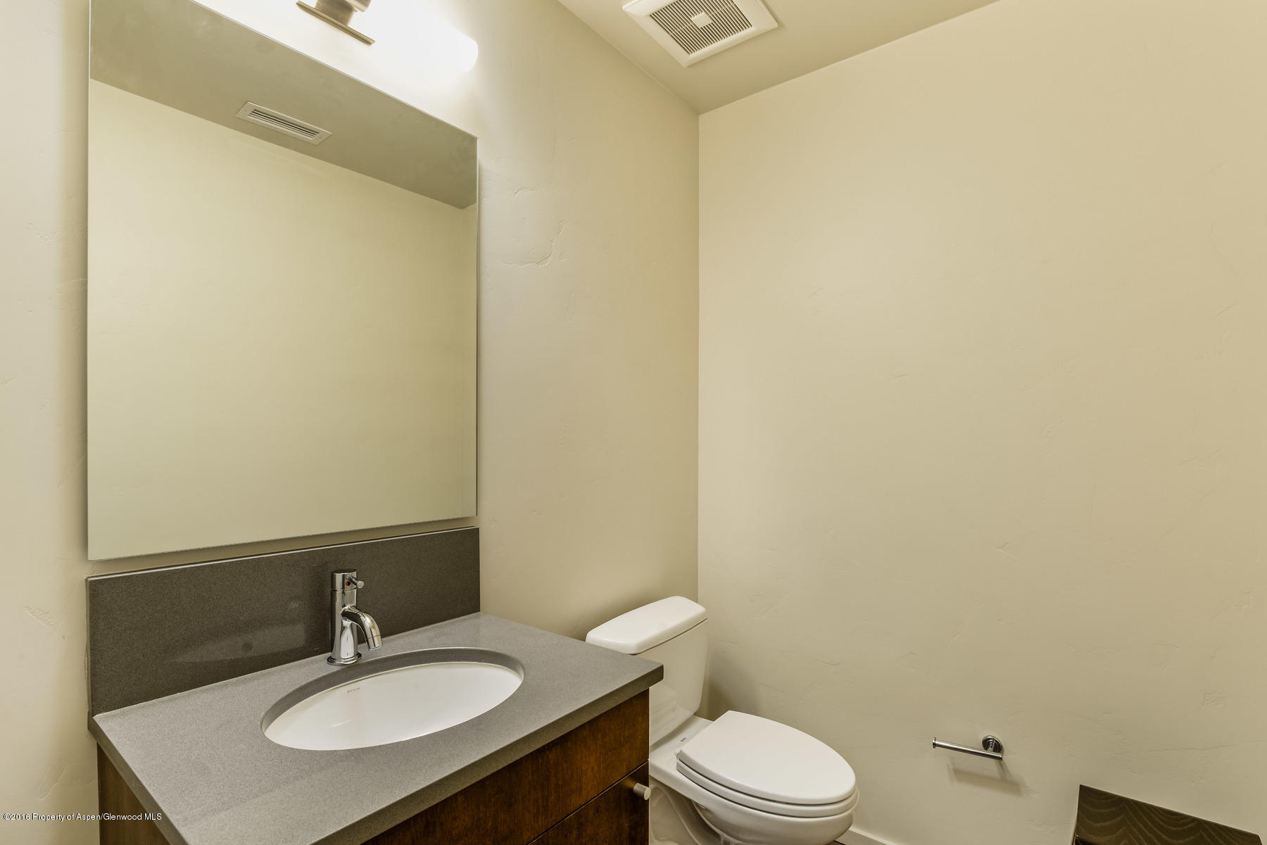 104 Evans Road, Unit 201 Basalt, CO 81621 - Photo 18 of 23 a bathroom with a sink toilet and a mirror