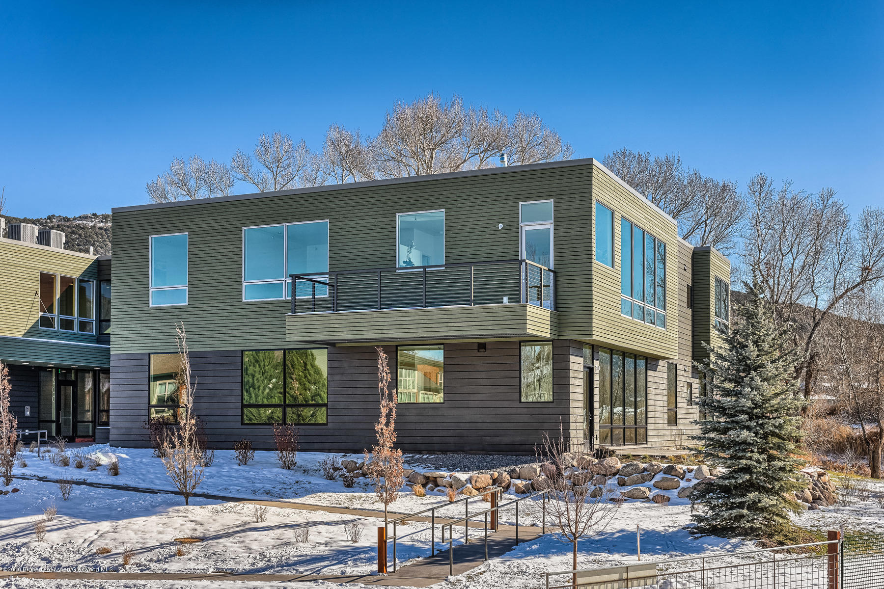 104 Evans Road, Unit 201 Basalt, CO 81621 - Photo 23 of 23 a front view of a house with garden
