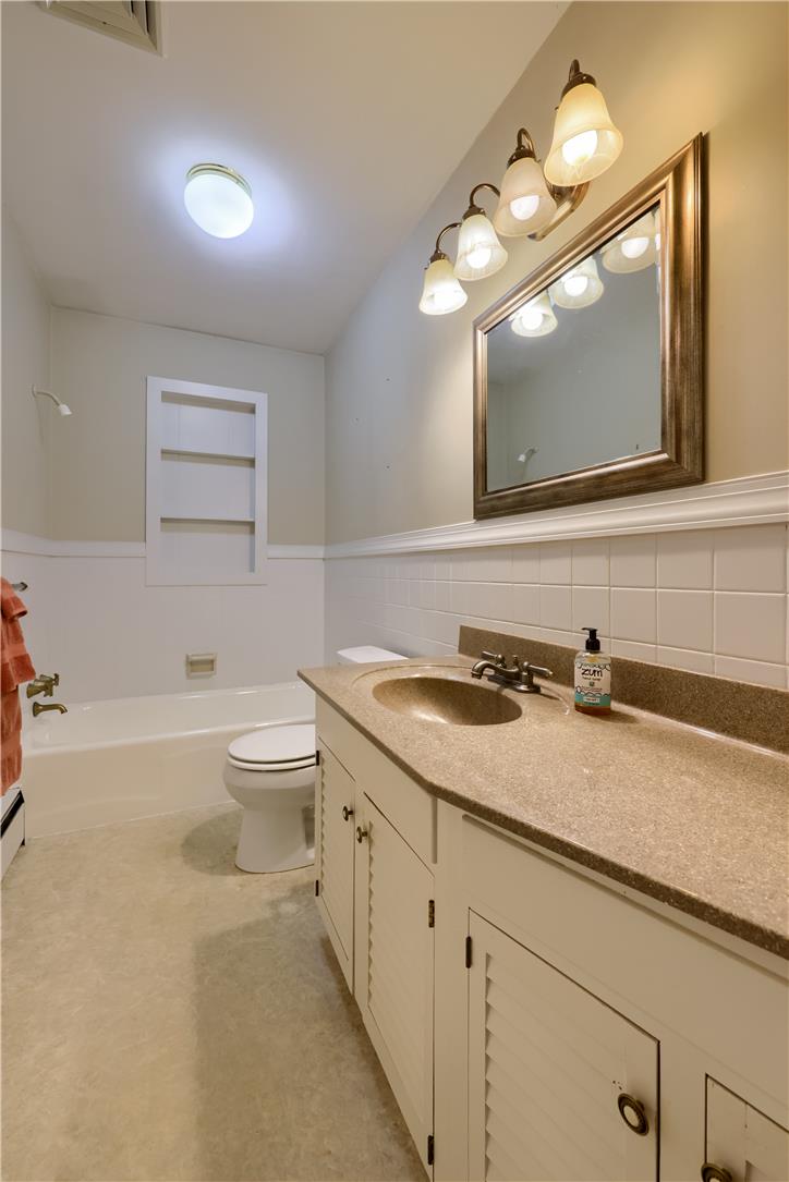 Coldsprings Rd Union Pottstown, PA 19465 - Photo 57 of 71 This bathroom features a single vanity with a practical sink and ample storage in the cabinetry below.
