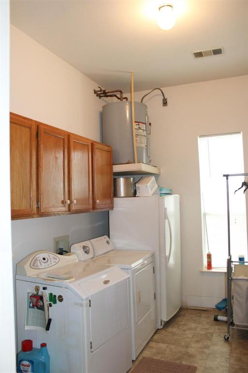 1365 Signal Road Quinlan, TX 75474 - Photo 21 of 33 a utility room with dryer and washer