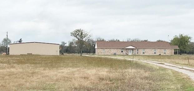 1365 Signal Road Quinlan, TX 75474 - Photo 3 of 33 a view of a large body of water with a building in the background