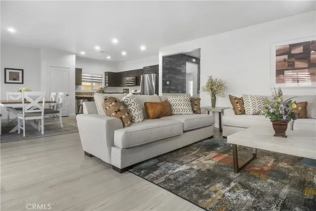 a living room with furniture and a couch