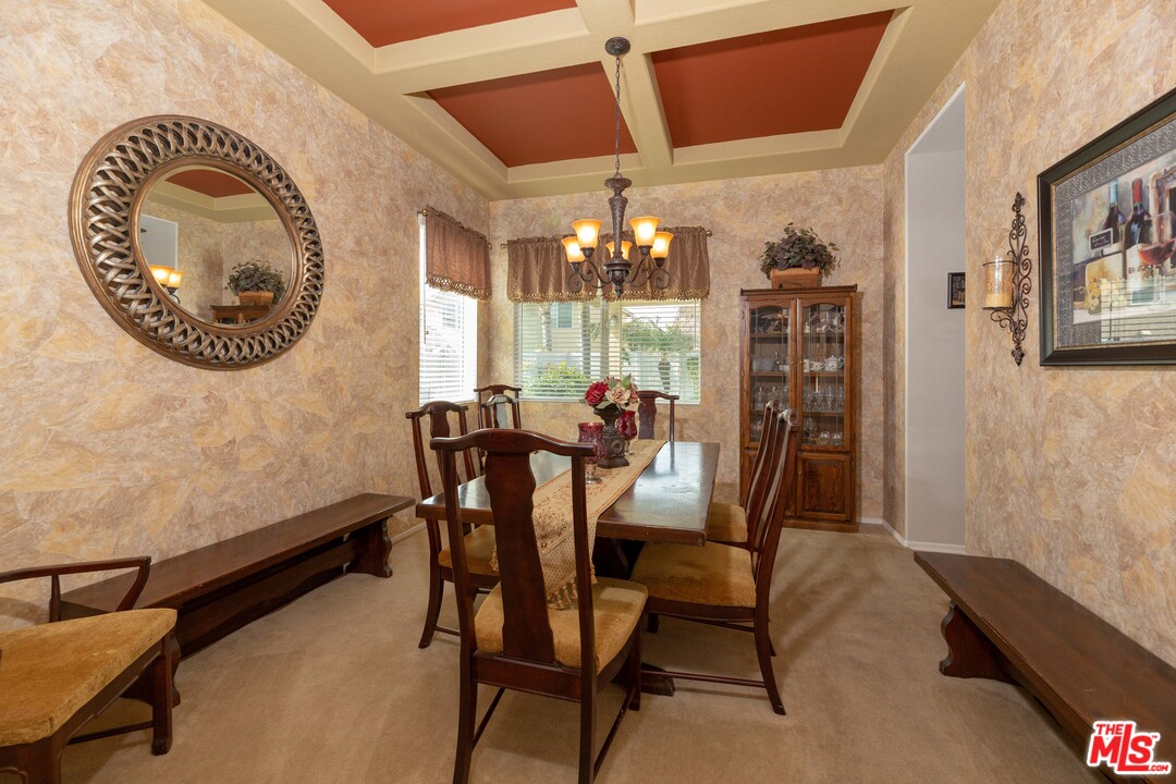6847 Raspberry Court Eastvale, CA 92880 - Photo 13 of 49 a dining room with furniture and window
