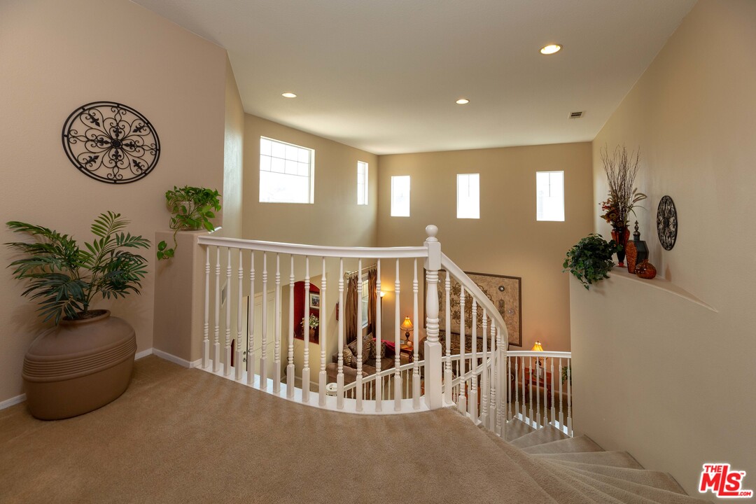 6847 Raspberry Court Eastvale, CA 92880 - Photo 24 of 49 a view of entryway with stairs