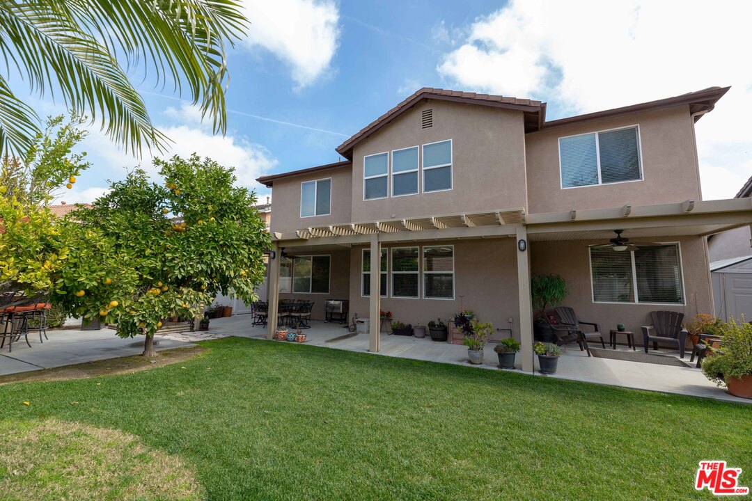 6847 Raspberry Court Eastvale, CA 92880 - Photo 39 of 49 a view of a house with furniture and garden