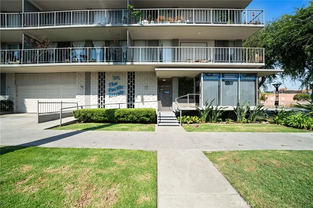 a house view with a garden space