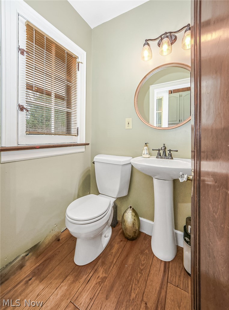 715 Ecton Road Akron, OH 44303 - Photo 12 of 30 The half bath just off the kitchen has also been updated. A custom rad cover will be installed.