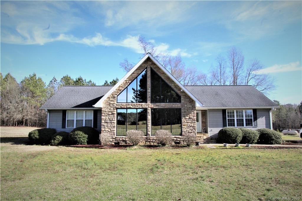 1244 Cameron Road Polkton, NC 28135 - Photo 1 of 19 a front view of a house with a yard