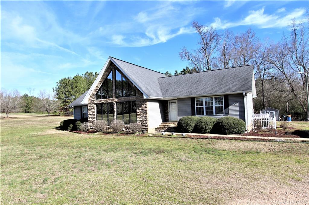 1244 Cameron Road Polkton, NC 28135 - Photo 2 of 19 a front view of a house with a yard