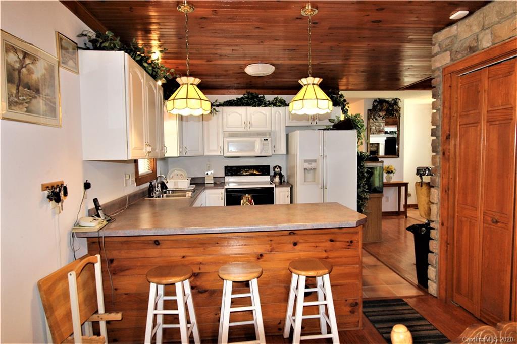 1244 Cameron Road Polkton, NC 28135 - Photo 12 of 19 a kitchen with a sink appliances and cabinets