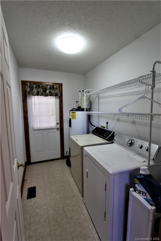 1244 Cameron Road Polkton, NC 28135 - Photo 16 of 19 a room with storage and utility