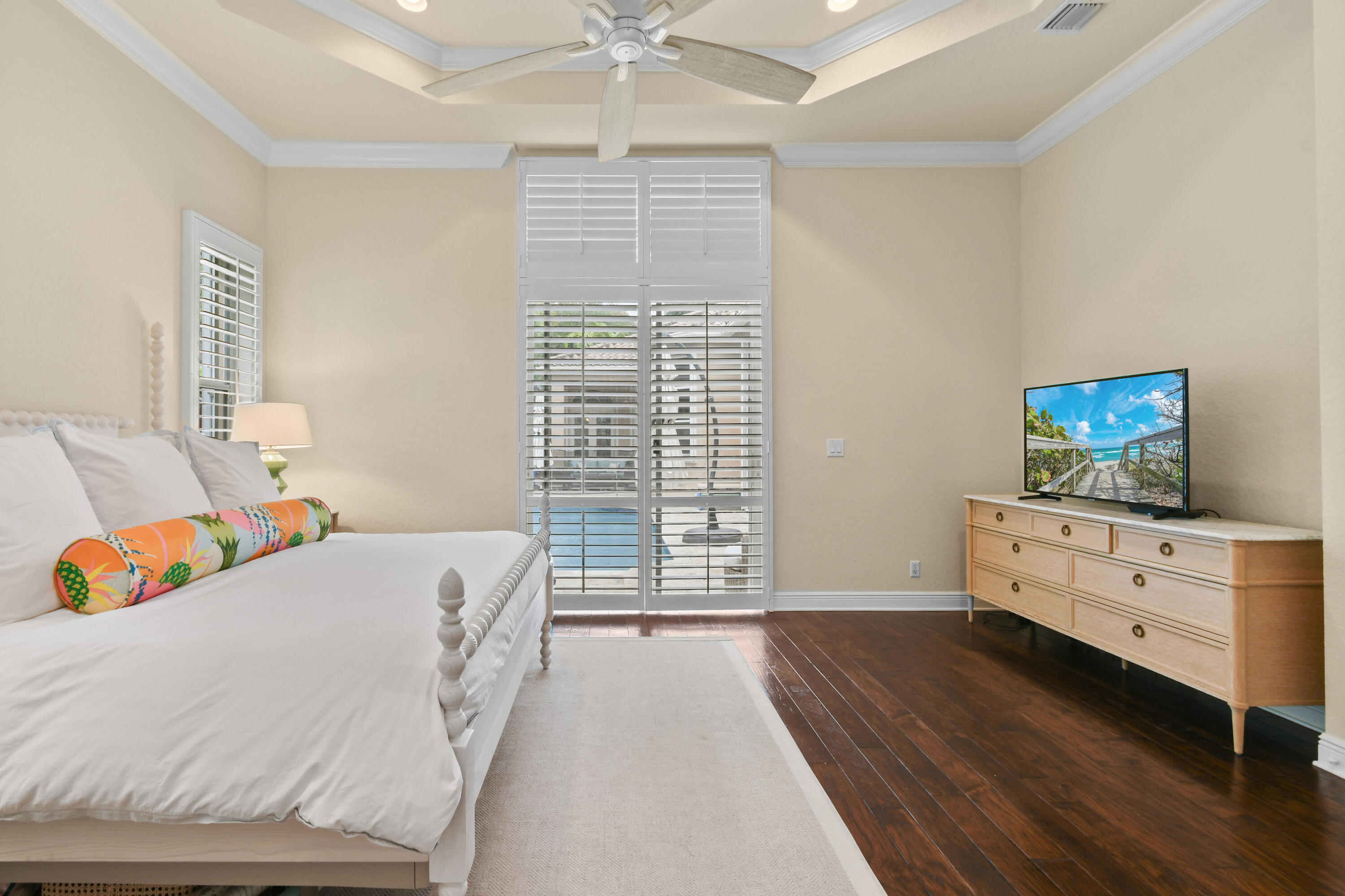 111 Bilboa Drive Jupiter, FL 33458 - Photo 27 of 35 a bedroom with a bed and a flat screen tv