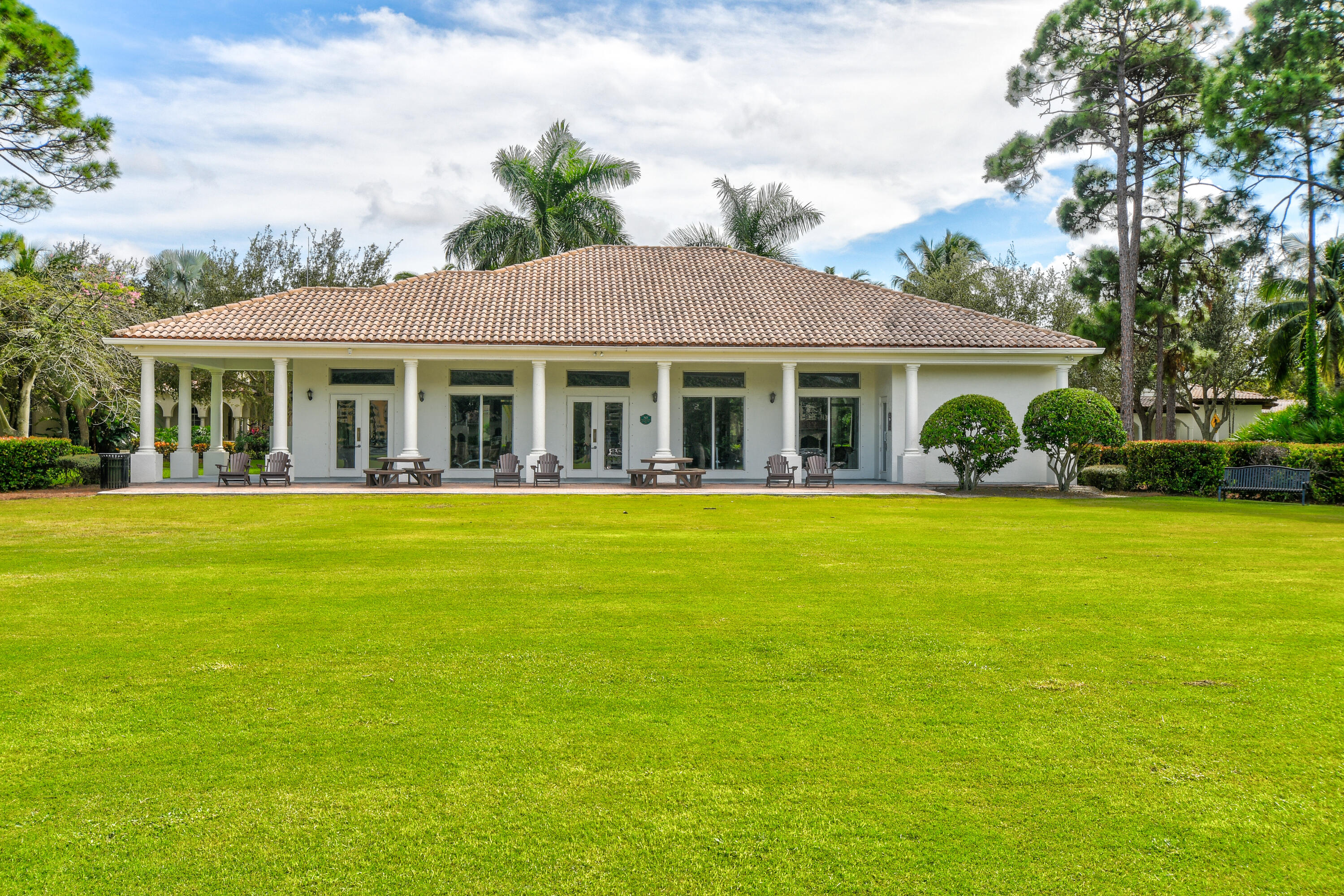 111 Bilboa Drive Jupiter, FL 33458 - Photo 34 of 35 a front view of house with yard and lake view