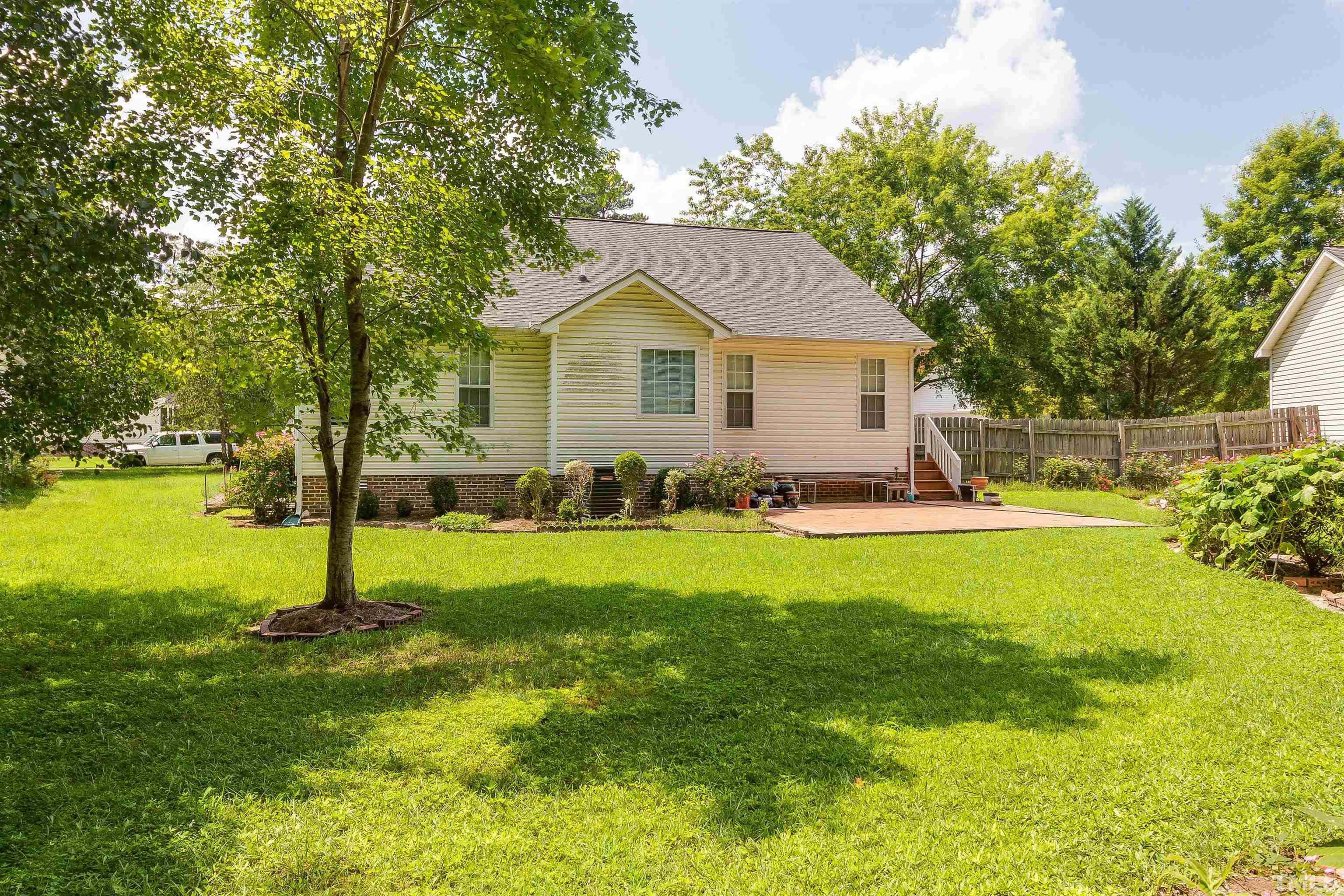 4216 Wolftrap Road Raleigh, NC 27616 - Photo 14 of 20 a house view with a garden space