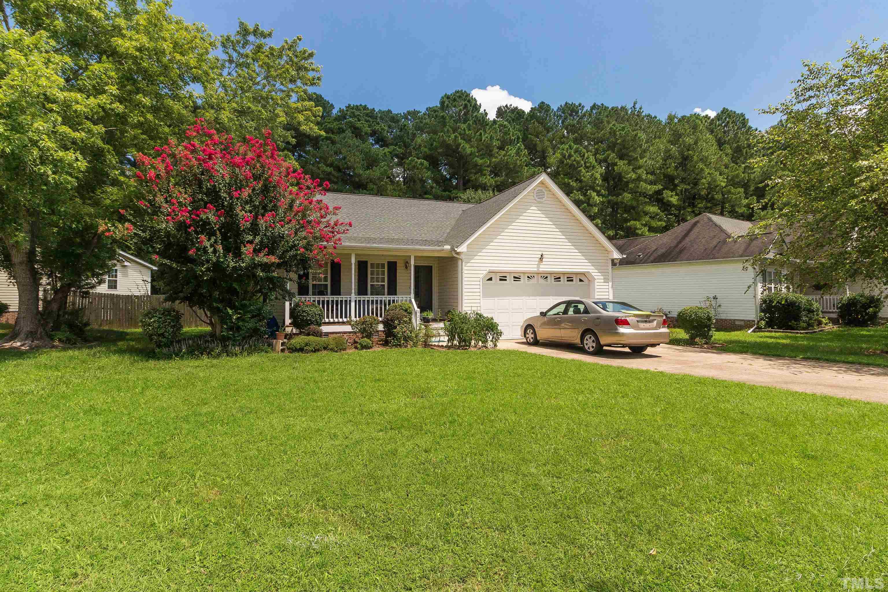 4216 Wolftrap Road Raleigh, NC 27616 - Photo 20 of 20 a front view of a house with garden