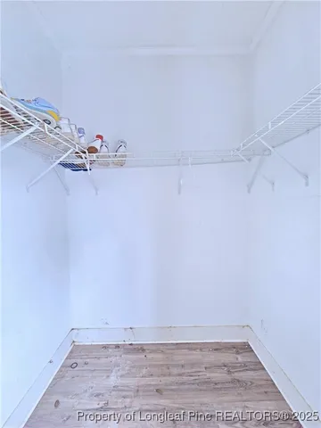 a view of a room with racks on the wall