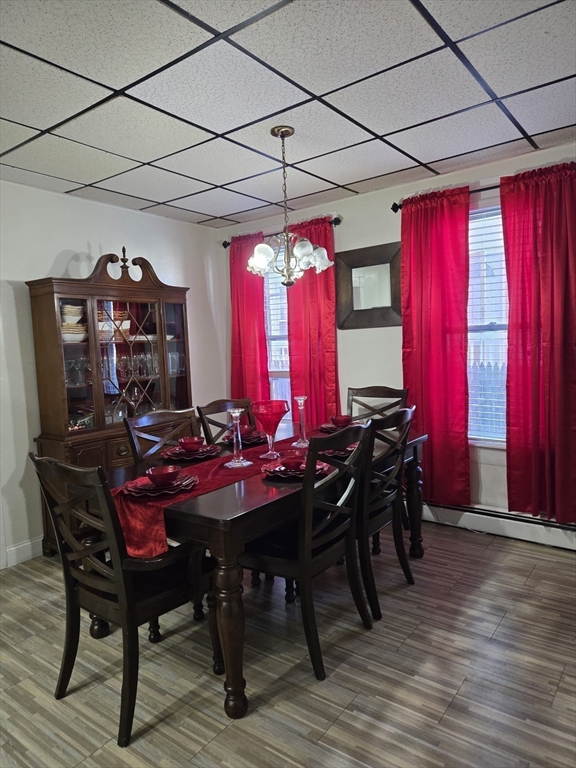 100 Bailey Street, Unit 1 Lawrence, MA 01843 - Photo 4 of 8 a view of a dining room with furniture and window