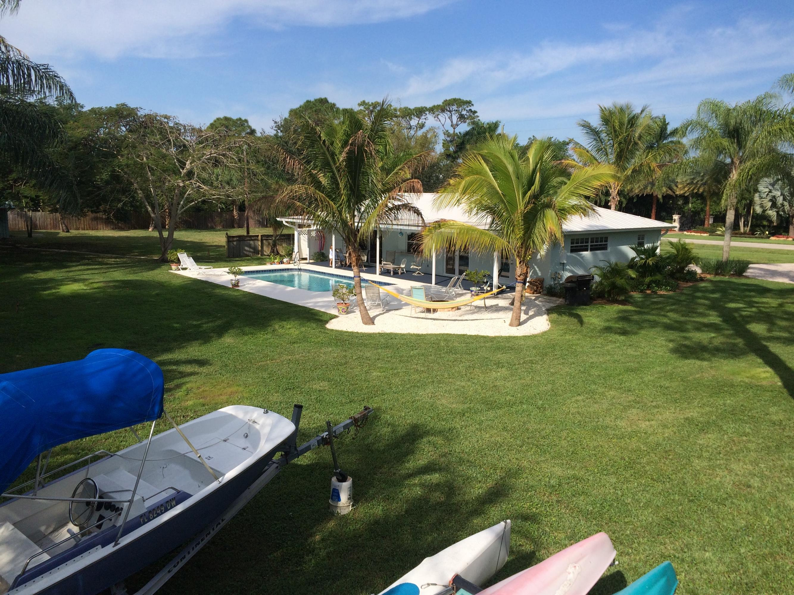 5540 Pennock Point Road Jupiter, FL 33458 - Photo 27 of 29 Backyard Rear View
