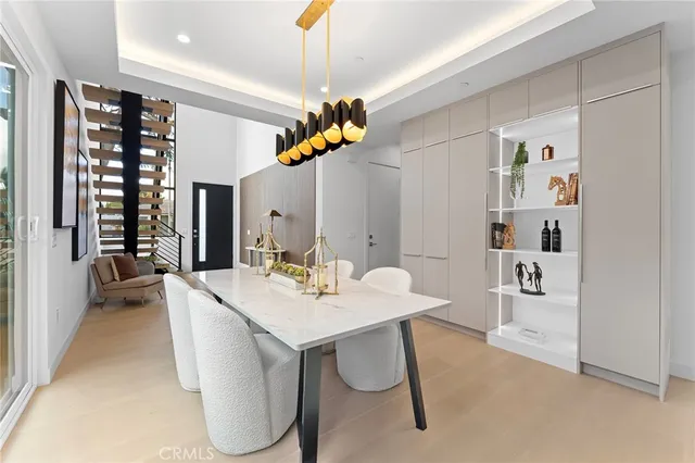 a view of entryway with a window and wooden floor